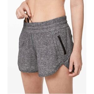 Lululemon Tracker Short V *4"
Heather Lux Multi Black Size 6